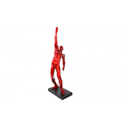 Statuette rouge main vers le ciel