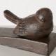 Cale-porte oiseau ou escargot en fonte
